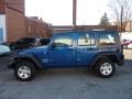 2010 Deep Water Blue Pearl Jeep Wrangler Unlimited Sport 4x4  photo #1