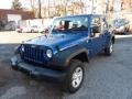 2010 Deep Water Blue Pearl Jeep Wrangler Unlimited Sport 4x4  photo #11