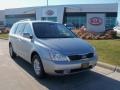 2011 Clear Silver Kia Sedona LX  photo #1