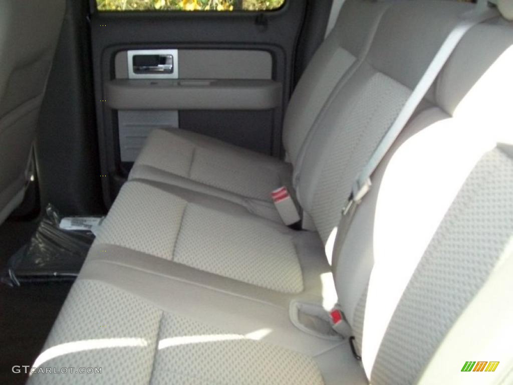 2010 F150 XLT SuperCrew - Tuxedo Black / Medium Stone photo #4