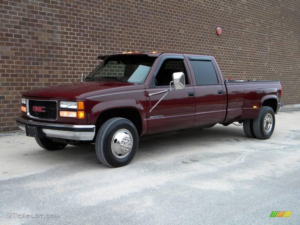 Dark Hunt Club Red Metallic 1997 GMC Sierra 3500 SLE Crew Cab 4x4 Dually Exterior Photo #40624422