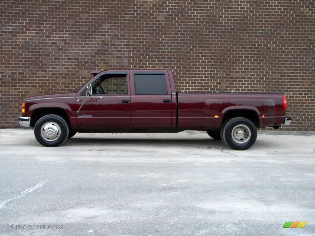 Dark Hunt Club Red Metallic 1997 GMC Sierra 3500 SLE Crew Cab 4x4 Dually Exterior Photo #40624430