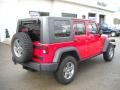 2010 Flame Red Jeep Wrangler Unlimited Rubicon 4x4  photo #2