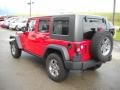 2010 Flame Red Jeep Wrangler Unlimited Rubicon 4x4  photo #4