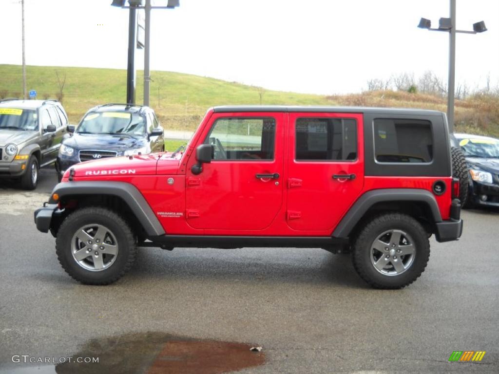 Flame Red 2010 Jeep Wrangler Unlimited Rubicon 4x4 Exterior Photo #40626268