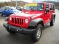 2010 Flame Red Jeep Wrangler Unlimited Rubicon 4x4  photo #18