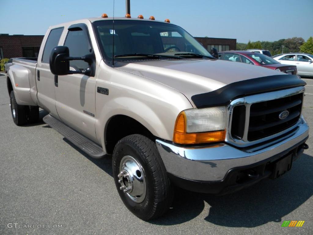 Light Prairie Tan Metallic 1999 Ford F350 Super Duty XLT Crew Cab 4x4 Dually Exterior Photo #40648410