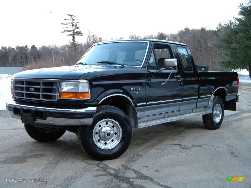 1997 F250 XLT Extended Cab 4x4 - Black / Medium Graphite photo #1