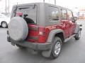 2009 Red Rock Crystal Pearl Jeep Wrangler Unlimited X 4x4  photo #2