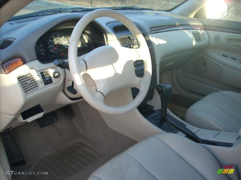 1999 Solara SLE V6 Coupe - Fairway Green Pearl / Ivory photo #10