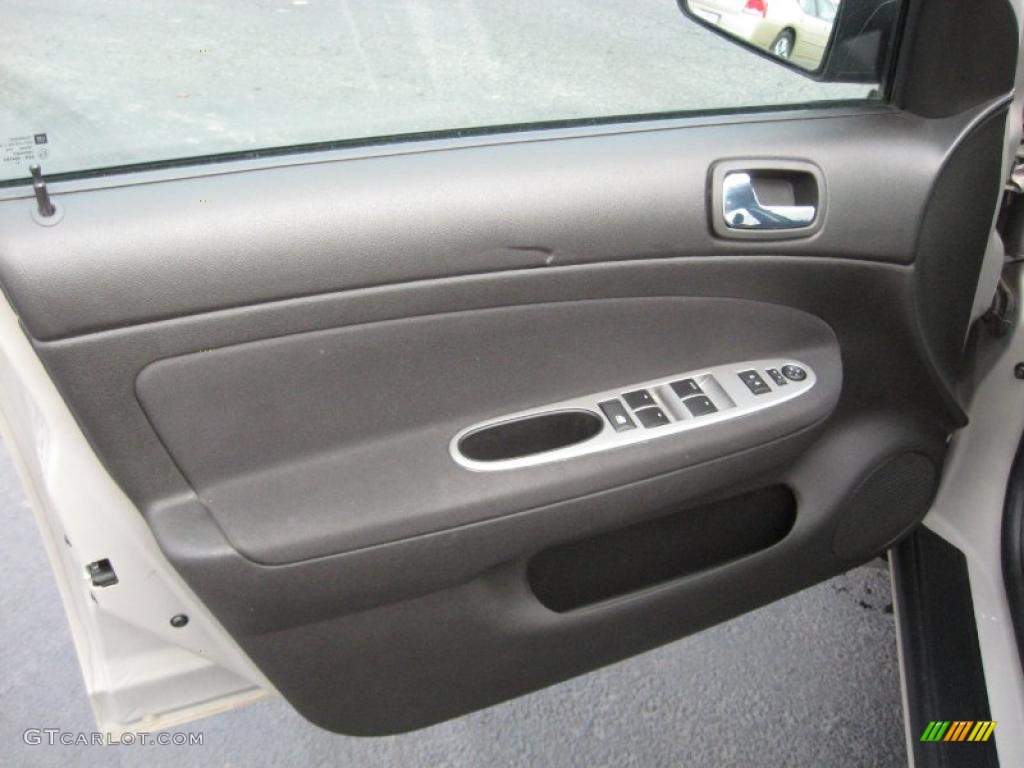 2009 Chevrolet Cobalt LT Sedan Ebony Door Panel Photo #40703521