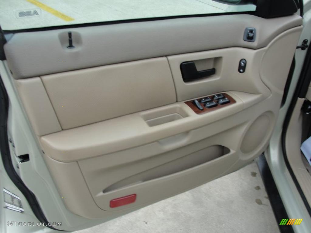 2005 Ford Taurus SEL Medium/Dark Pebble Door Panel Photo #40718814