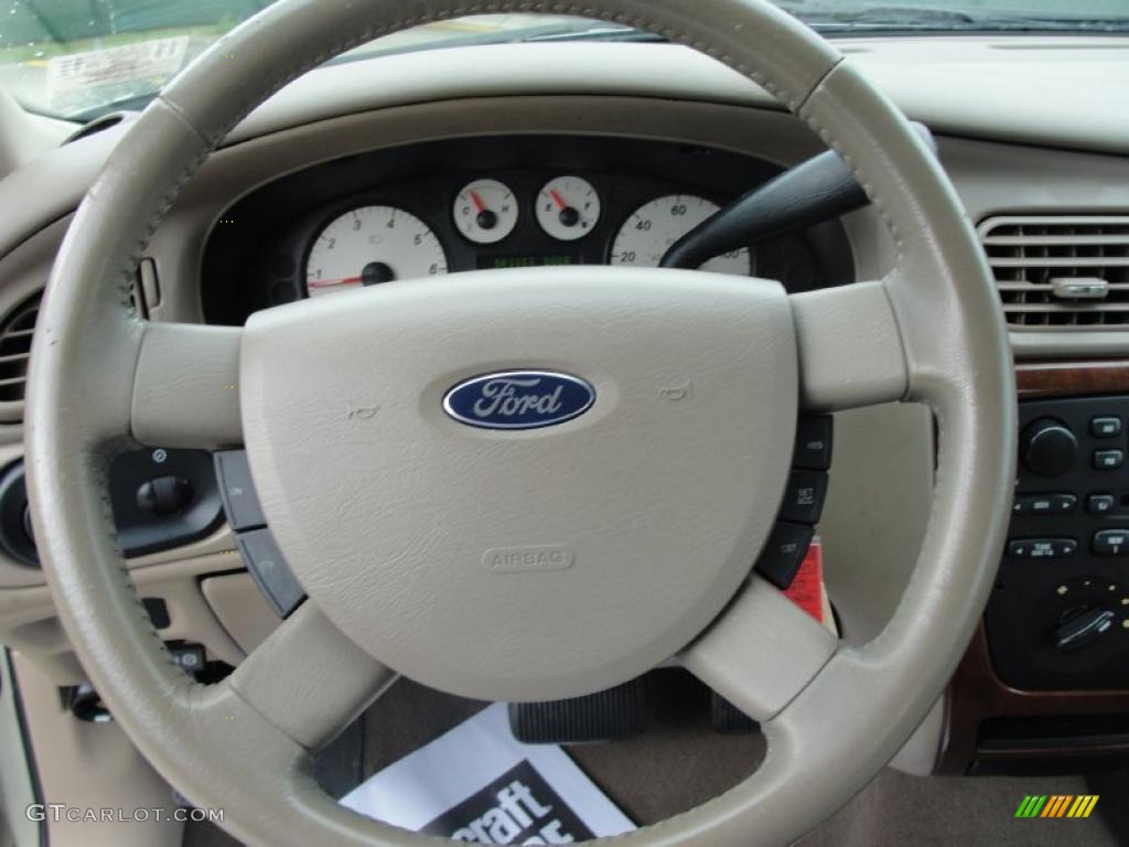 2005 Ford Taurus SEL Medium/Dark Pebble Steering Wheel Photo #40718902