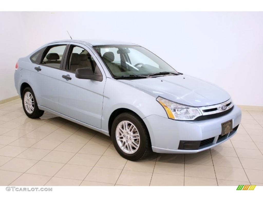 2009 Focus SE Sedan - Light Ice Blue Metallic / Medium Stone photo #1