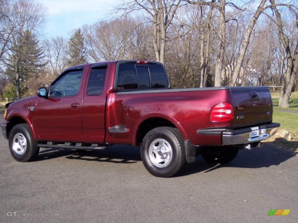 1999 F150 XLT Extended Cab 4x4 - Dark Toreador Red Metallic / Medium Graphite photo #6