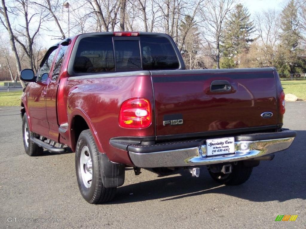 1999 F150 XLT Extended Cab 4x4 - Dark Toreador Red Metallic / Medium Graphite photo #16