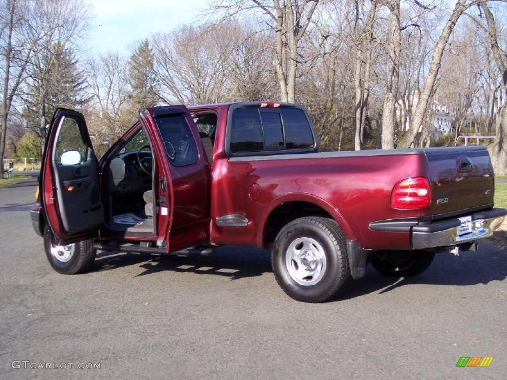 1999 F150 XLT Extended Cab 4x4 - Dark Toreador Red Metallic / Medium Graphite photo #18