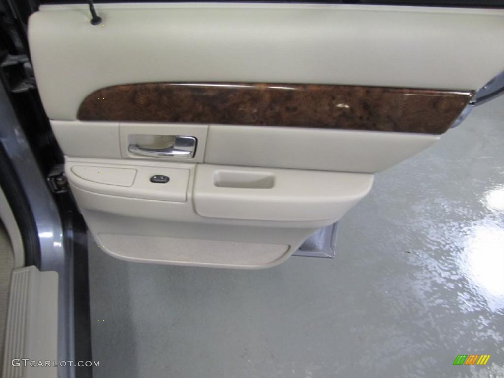 2006 Mercury Grand Marquis LS Medium Light Stone Door Panel Photo #40740687