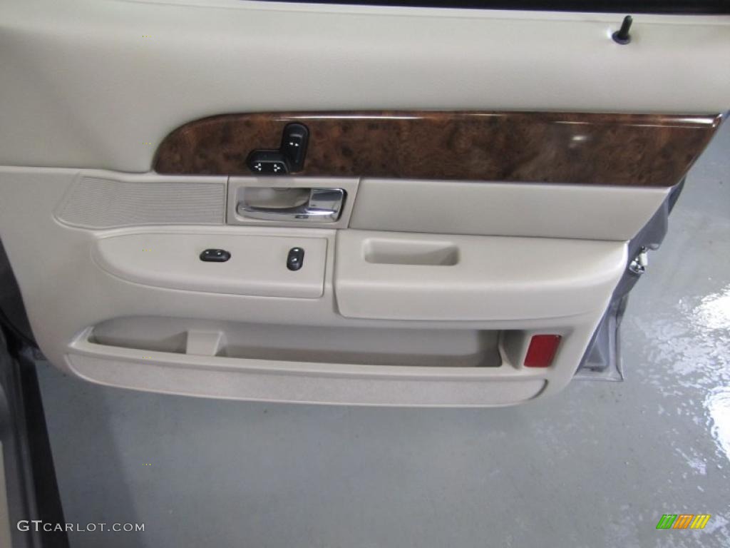 2006 Mercury Grand Marquis LS Medium Light Stone Door Panel Photo #40740719