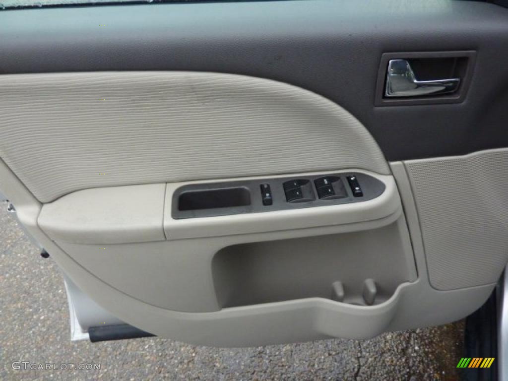 2008 Ford Taurus SEL AWD Medium Light Stone Door Panel Photo #40759907