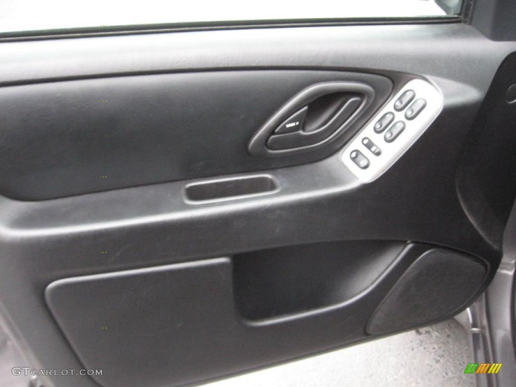 2006 Ford Escape Limited Ebony Black Door Panel Photo #40765207