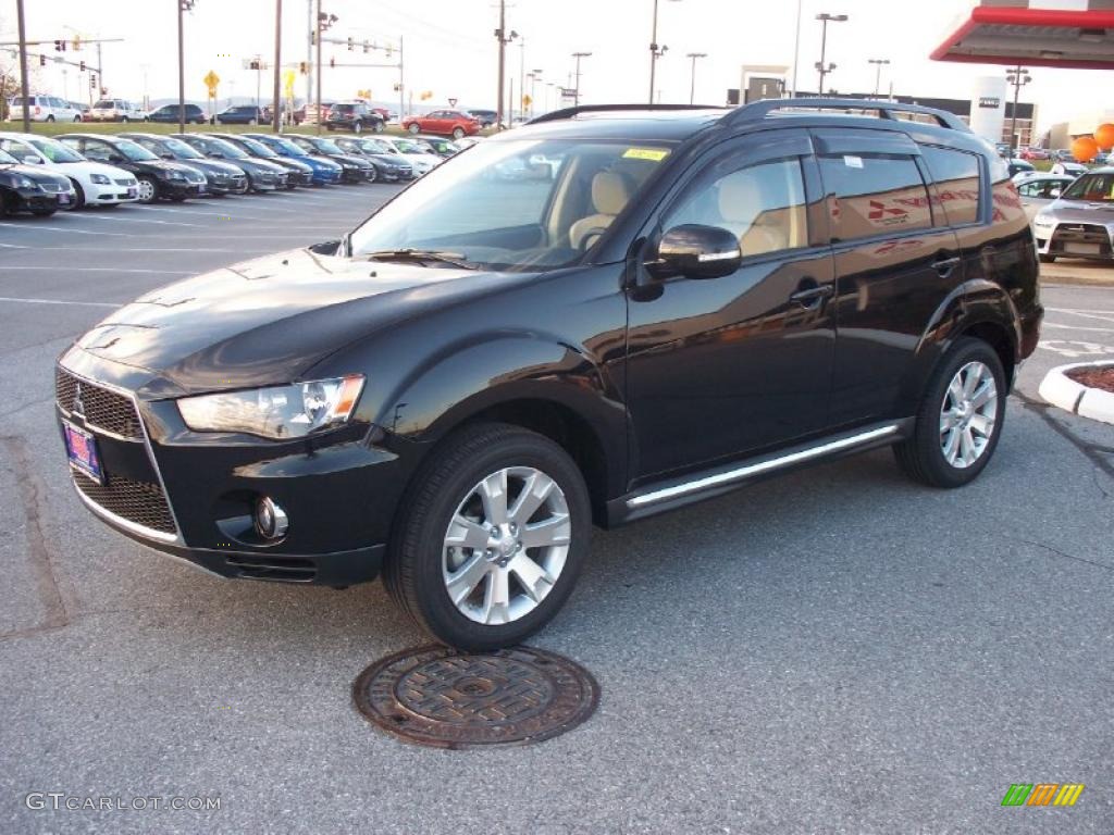 2011 Outlander SE - Labrador Black Pearl / Beige photo #1