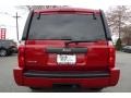 2009 Inferno Red Crystal Pearl Jeep Commander Sport 4x4  photo #11