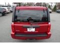 2009 Inferno Red Crystal Pearl Jeep Commander Sport 4x4  photo #15