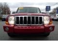 2009 Inferno Red Crystal Pearl Jeep Commander Sport 4x4  photo #16
