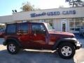 2010 Red Rock Crystal Pearl Jeep Wrangler Unlimited Sport  photo #1