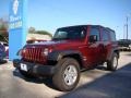 2010 Red Rock Crystal Pearl Jeep Wrangler Unlimited Sport  photo #4