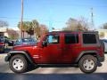 2010 Red Rock Crystal Pearl Jeep Wrangler Unlimited Sport  photo #5