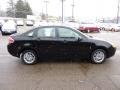 2011 Ebony Black Ford Focus SE Sedan  photo #5