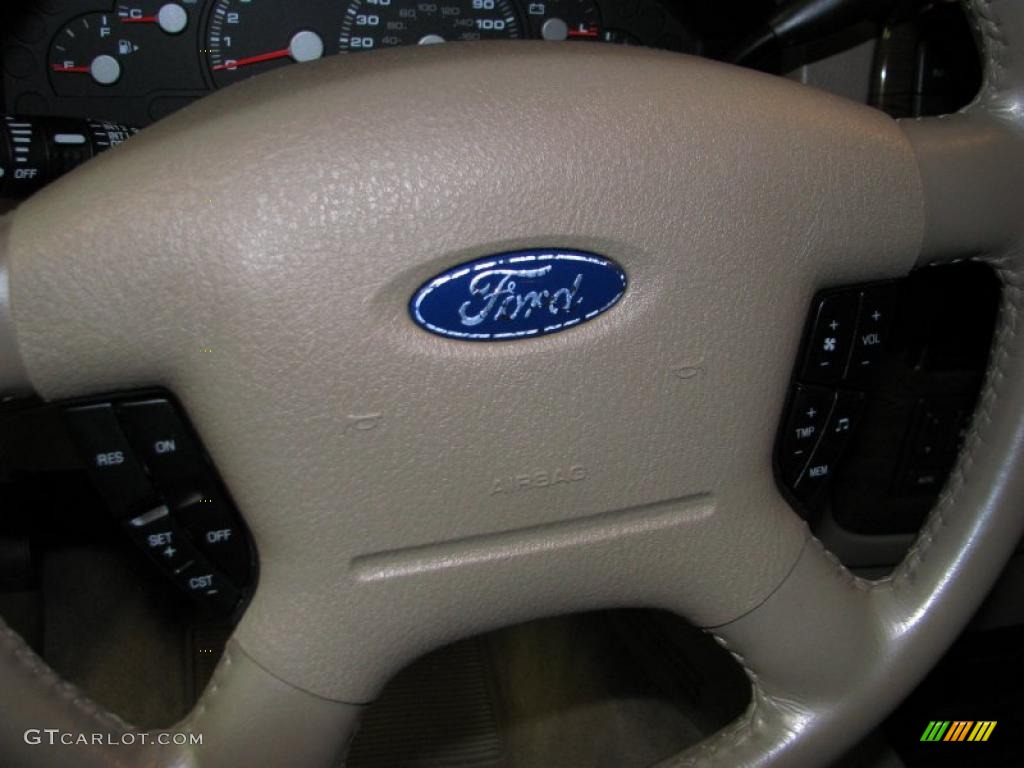 2004 Explorer Eddie Bauer 4x4 - Redfire Metallic / Medium Parchment photo #25