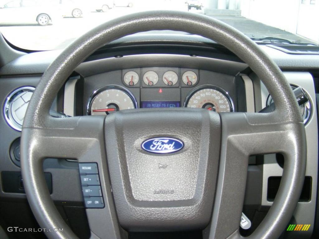 2010 Ford F150 XLT SuperCrew 4x4 Medium Stone Steering Wheel Photo #40876402