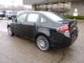 2011 Ebony Black Ford Focus SES Sedan  photo #2