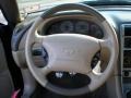 Medium Parchment Steering Wheel Photo for 2003 Ford Mustang #40908821