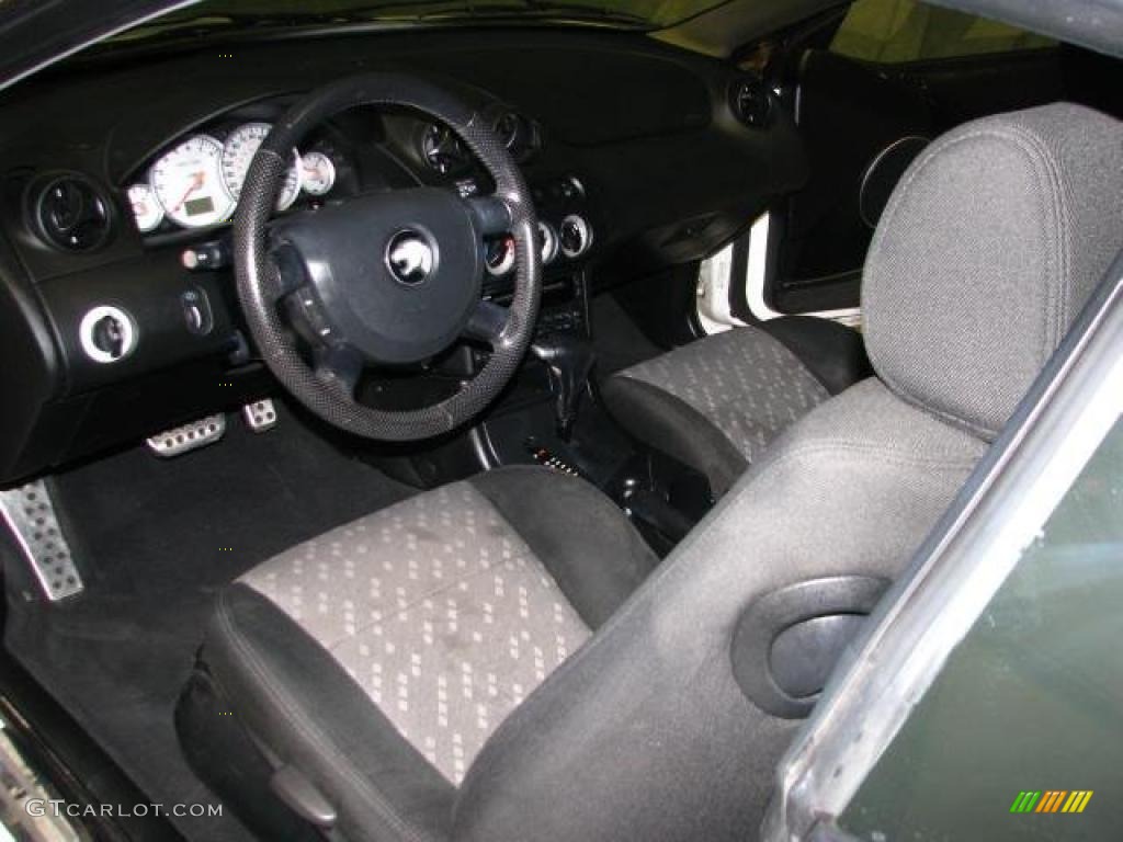 2002 Cougar V6 Coupe - Vibrant White / Midnight Black photo #6