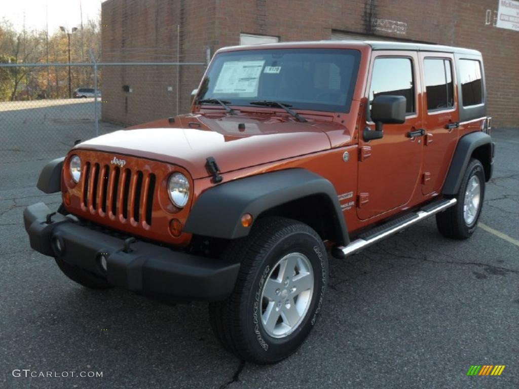Mango Tango Pearl 2011 Jeep Wrangler Unlimited Sport 4x4 Exterior Photo #40959825