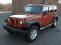 Mango Tango Pearl 2011 Jeep Wrangler Unlimited Sport 4x4 Exterior