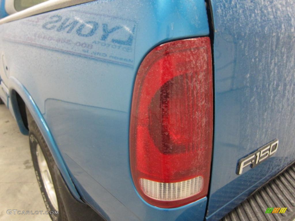 1997 F150 XLT Extended Cab 4x4 - Portofino Blue Metallic / Medium Graphite photo #30
