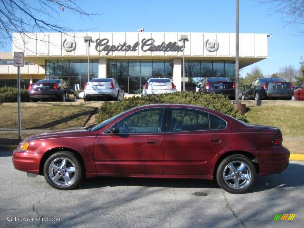 2003 Grand Am SE Sedan - Redfire Metallic / Dark Pewter photo #1