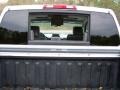 2005 Radiant Silver Nissan Titan LE Crew Cab 4x4  photo #52