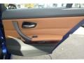 Saddle Brown Dakota Leather Door Panel Photo for 2011 BMW 3 Series #41046429