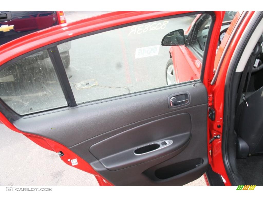 2010 Chevrolet Cobalt LT Sedan Ebony Door Panel Photo #41064011