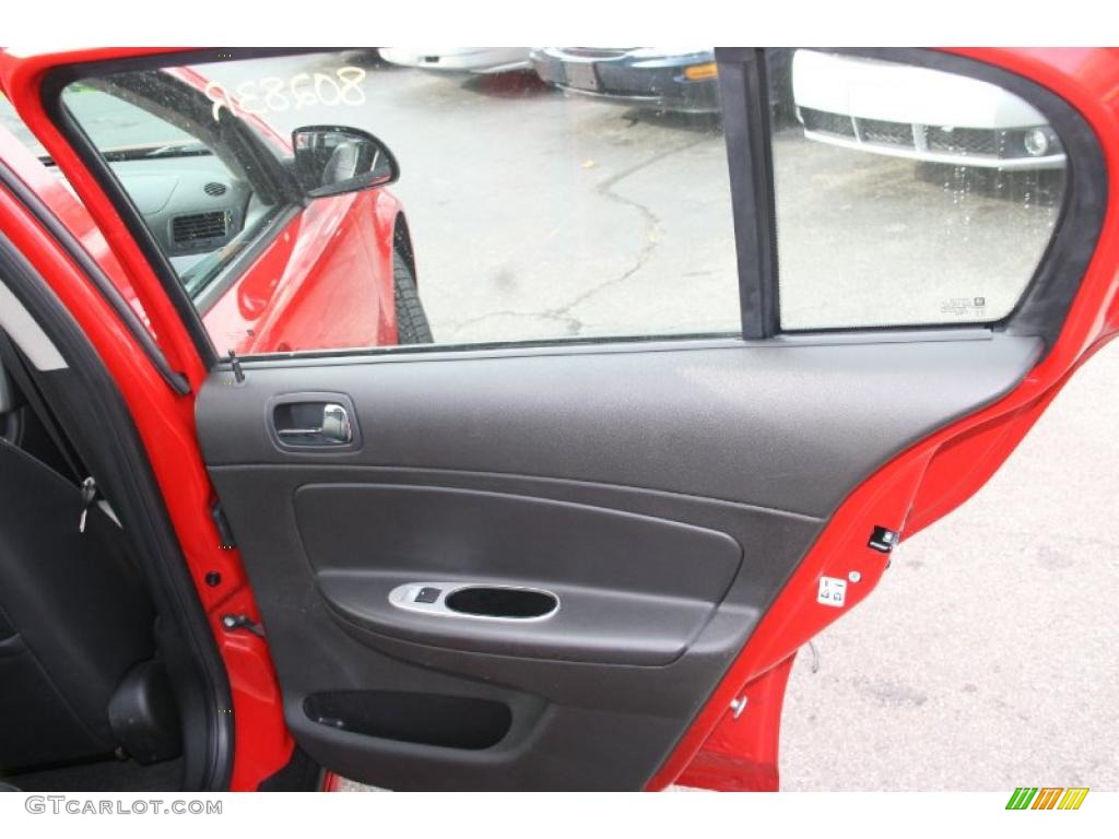 2010 Chevrolet Cobalt LT Sedan Ebony Door Panel Photo #41064039