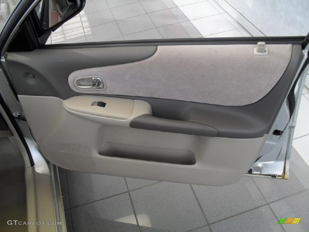 2003 Mazda Protege LX Beige Door Panel Photo #41084239