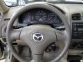 Beige 2003 Mazda Protege LX Steering Wheel