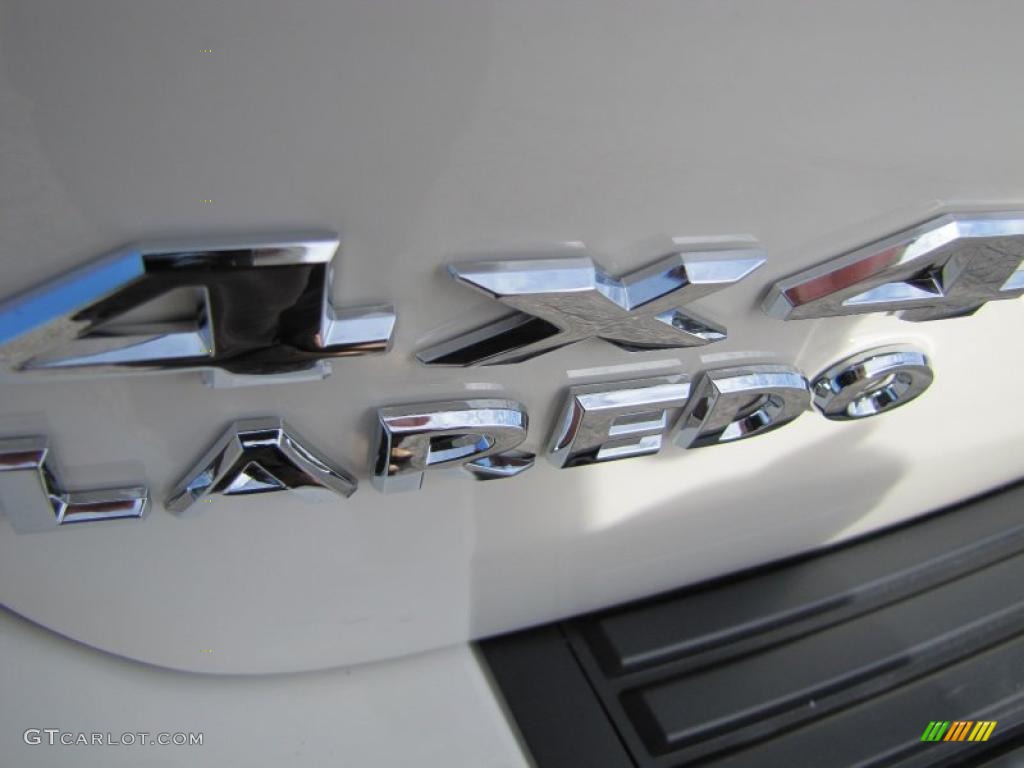 2011 Jeep Grand Cherokee Laredo X Package 4x4 Marks and Logos Photo #41105630