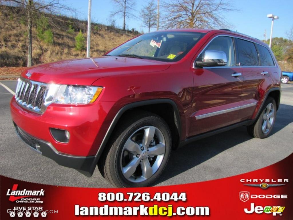 2011 Grand Cherokee Overland 4x4 - Inferno Red Crystal Pearl / Dark Frost Beige/Light Frost Beige photo #1